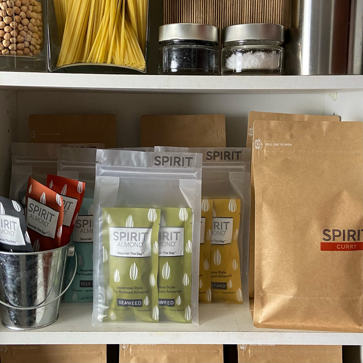 SPIRIT Almond packages inside a kitchen pantry