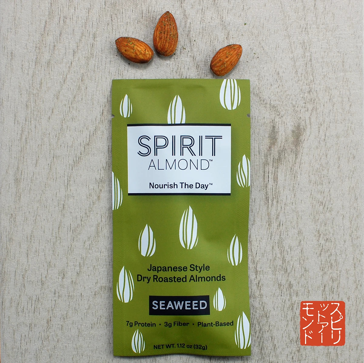 Package of SPIRIT Almond Seaweed flavor, with a few almonds displayed