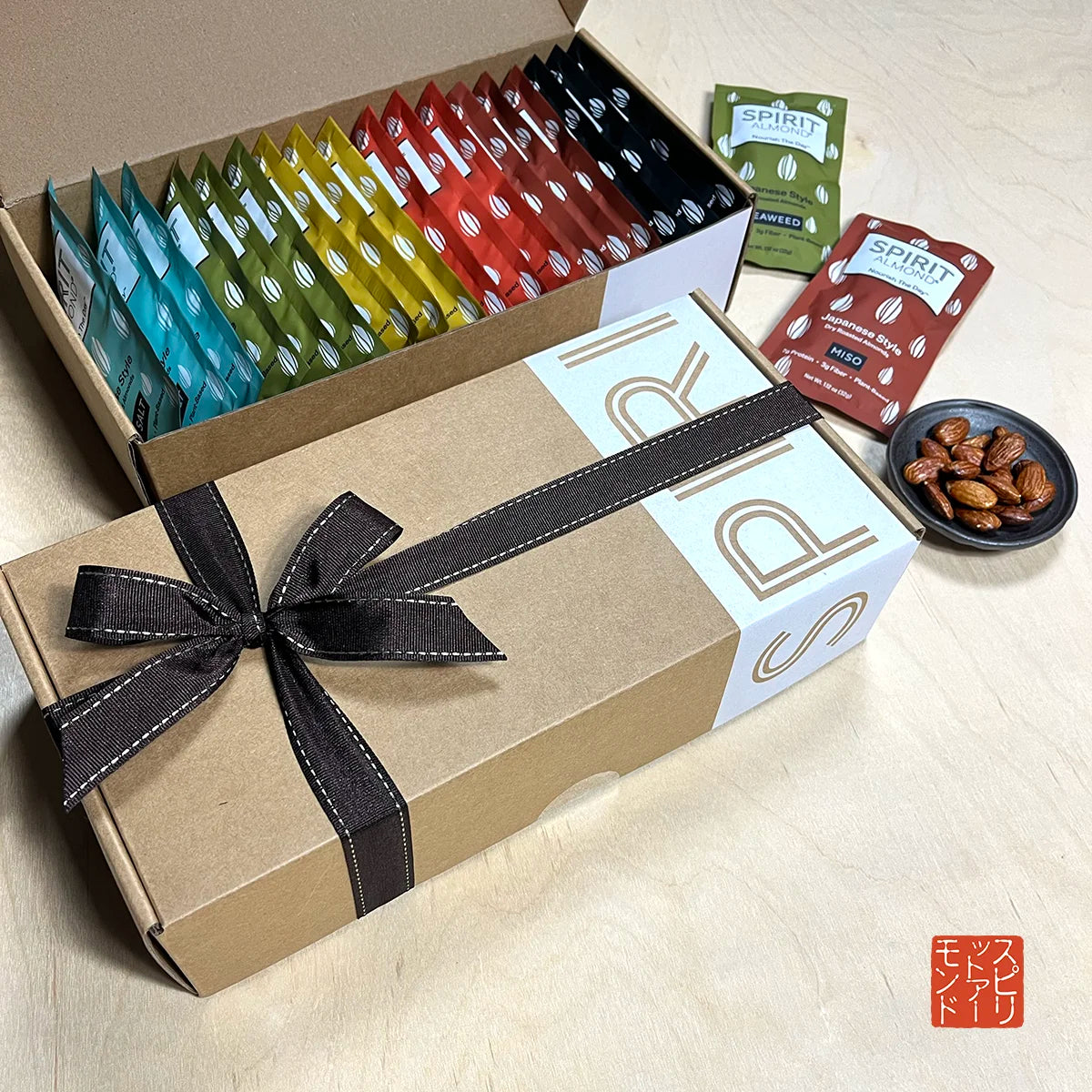 SPIRIT Almond Japanese Style Dry Roasted Almonds Gift Box in colorful lineup with stitched ribbon.